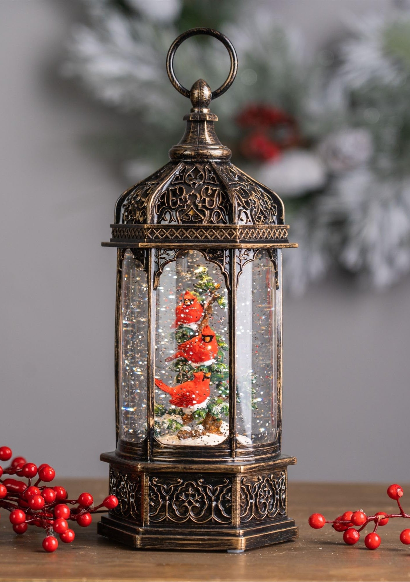 Enchanting Lantern Snow Globe with Cardinals
