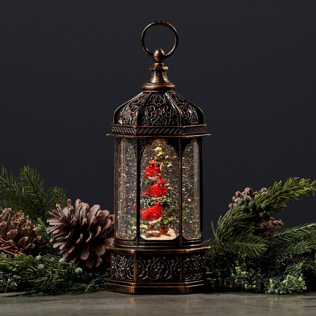 Enchanting Lantern Snow Globe with Cardinals