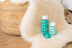 Lifefactory 4 Bottle Starter Set (2) 4-Ounce Baby Bottle in Mint/Lavender (2) 9-Ounce Baby Bottle in Kale/Grape (2) Flat Caps (2) Sippy Caps (2) Stage 2 Nipples